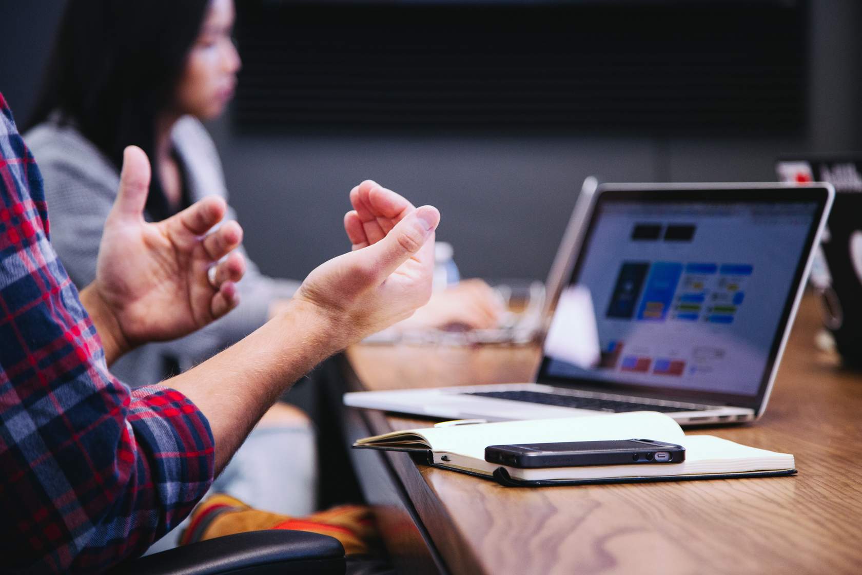 hands directed at screen giving feedback